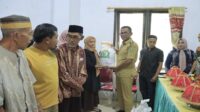 Pj. Bupati Takalar Serahkan Bantuan di Kecamatan Mangarabombang