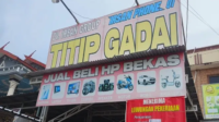 CV Irsan Phone Diduga Beroperasi Tanpa Izin, F-KRB Desak OJK Bertindak!
